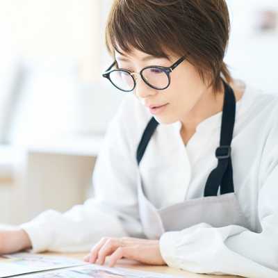 A woman fully focused on her work